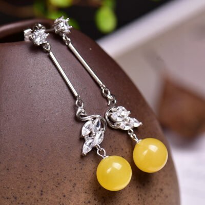 Natural Baltic mineral honey thread, chicken oil yellow 👍 Paired with 925 sterling silver accessories, the honey wax has a diameter of approximately 8.5mm, making it charming and elegant. 1020759