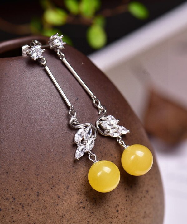 Natural Baltic mineral honey thread, chicken oil yellow 👍 Paired with 925 sterling silver accessories, the honey wax has a diameter of approximately 8.5mm, making it charming and elegant. 1020759