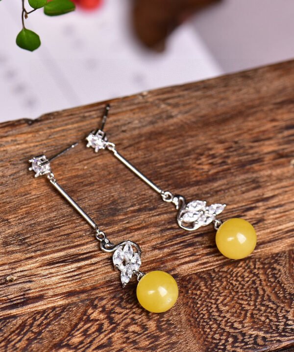 Natural Baltic mineral honey thread, chicken oil yellow 👍 Paired with 925 sterling silver accessories, the honey wax has a diameter of approximately 8.5mm, making it charming and elegant. 1020759