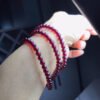 Natural Wine Red Garnet Three Ring Bracelet, with beads approximately 5.6 to 5.7mm in diameter2610169354