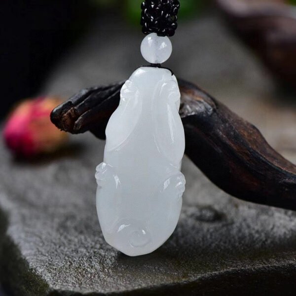 The natural Hotan Jade sheep fat jade mythical wild animal pendant! Pendant size: 39.7/19.2/14mm2710289164