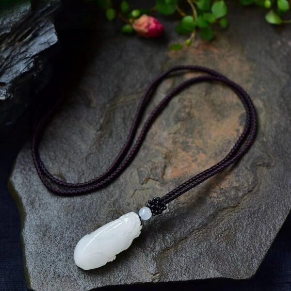 The natural Hotan Jade sheep fat jade mythical wild animal pendant! Pendant size: 39.7/19.2/14mm2710289164