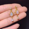 Pure natural dazzling white opal earrings, with a main stone size of 6 * 8mm0811140512