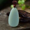 The naturally selected Hetian Yuengong pendant has a size of about 49.6 * 27.6 * 8.8mm.1114119822