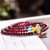 Natural wine red garnet three loop bracelet, with a bead diameter of approximately 4.8mm1114135344